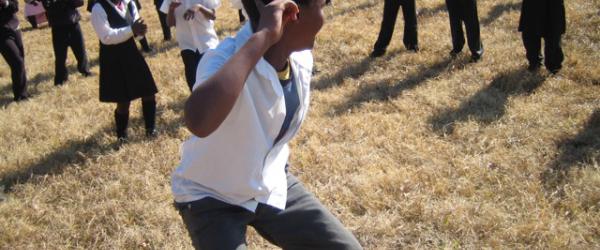 First sing and dance outside, before expressing happy inspiration in drawing inside the classroom, K-more school, Drakensberg, 2009